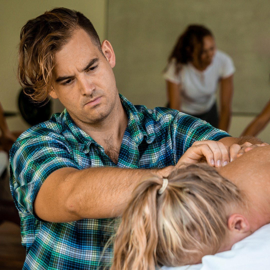 Students practicing massage therapy