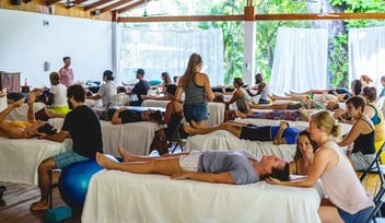 students practicing craniosacral at crsmt in costa rica